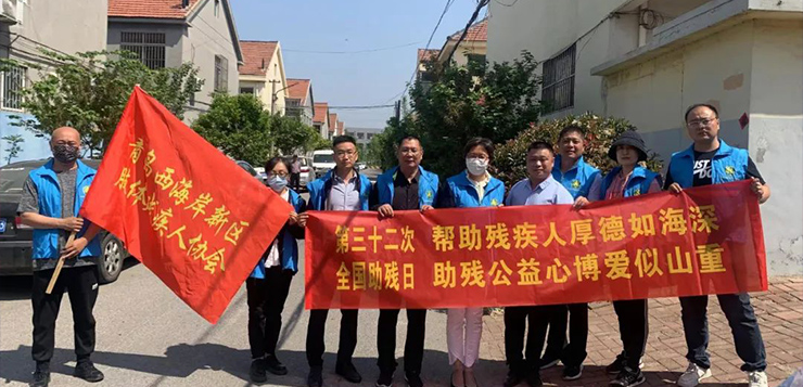 长青中国再次携手残联传递爱心汇聚温暖